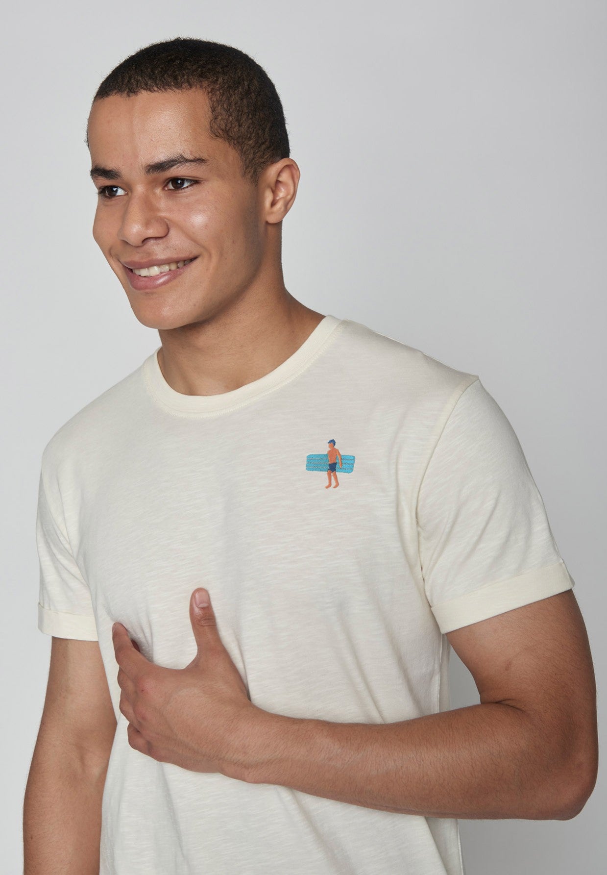 T-shirt Roll mit Luftmatraze auf Crèmeweiss von Greenbomb