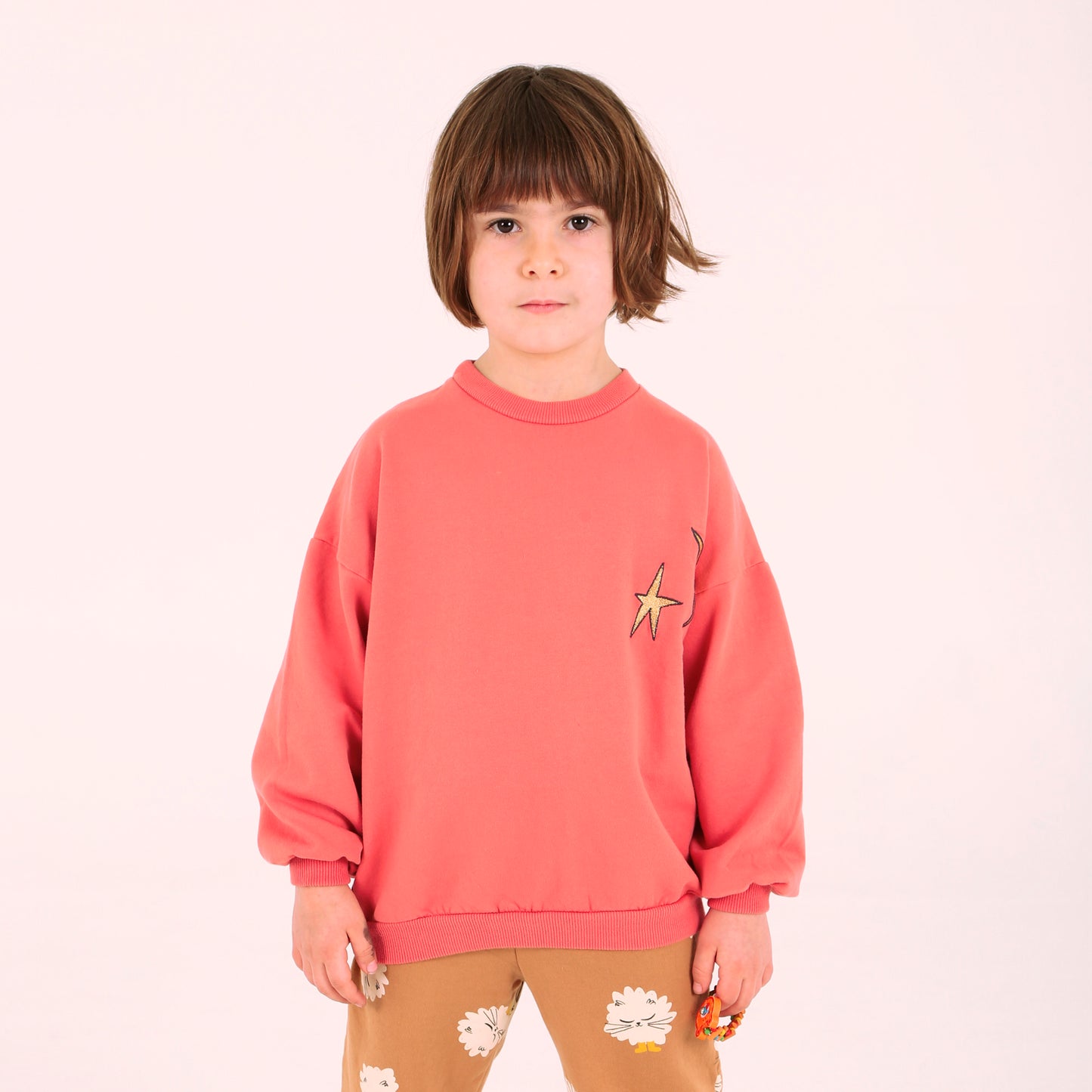Sweatshirt mit Mond und Stern auf Koralle